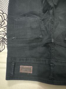 Ripped Black Denim Jeans