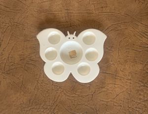 butterfly-shaped palette tray