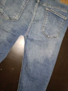 Ripped Knee Jeans