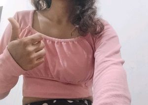 a pink top