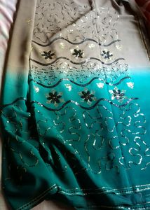Chiffon Or Suythetic Saree.