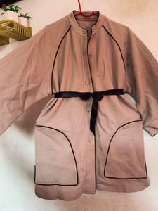 Elegant Beige Coat with Black Trim