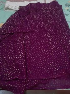 Purple saree with gold polka dots