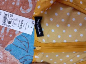Polka Dot Peplum Top