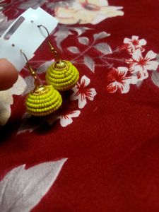 Yellow beaded jhumka earrings
