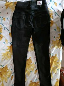 It Is Black Jeans With Tag And Solid  Colour