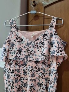 peach and black colored evening gown