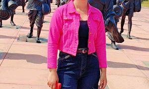 Pink cropped denim jacket