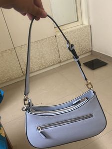 GUESS Women Solid Half Moon Fringed Shoulder bag