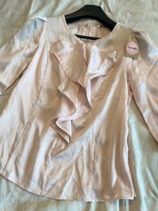 Peach Ruffle Top🤍