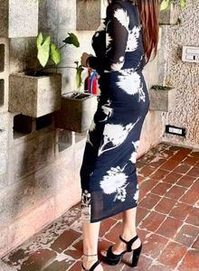 Black Doll Net Bodycon Dress.