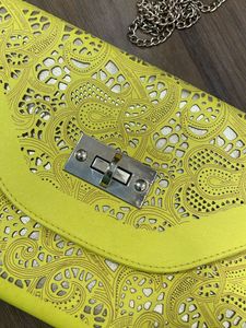 A Neon Cutwork Envelope Sling Bag