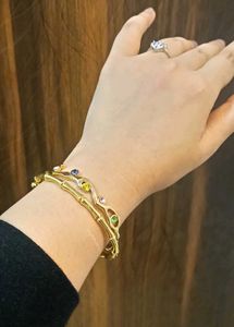 Gold Bangle Bracelet with Gemstones