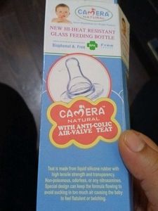 Nipples &amp; Caps Of Feeding Bottles