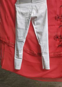 Ripped White High-Waisted Jeans