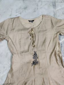 cream gown with mint green jacket