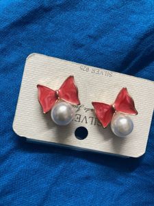 Earrings.  pearltop