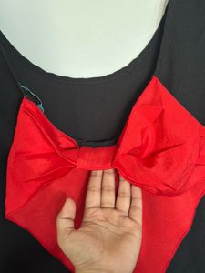 Chic Black Top w/ Red Bow
