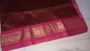 Elegant Maroon Silk Saree with Pink Zari Border