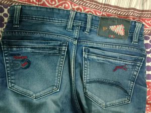 Distressed Blue Jeans