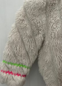 white fur jacket