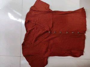 3 rust Ruffled Knit Top