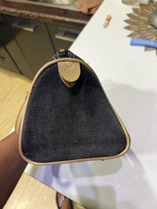 IS.Maru Handbag