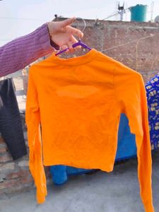Orange Cutout Long Sleeve Top