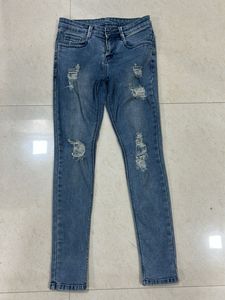 Distressed Denim Skinny Jeans