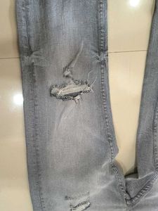 Distressed Gray Skinny Jeans