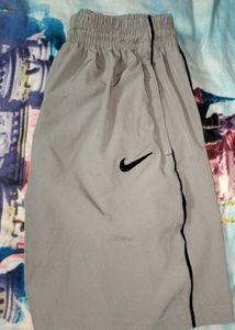 Nike Gray Athletic Shorts | Zipped Pockets