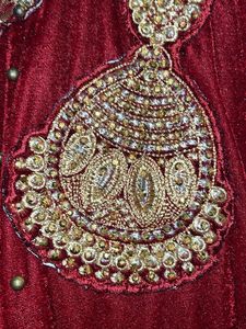 Long maroon Velvet gown With beads Work