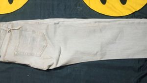 Light Silver Coloured Jeans. Unused