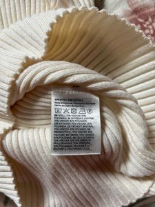 H&amp;M ribbed knit boat neck top .