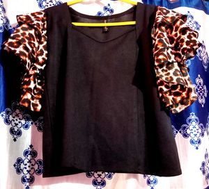 Animal print black ruffle sleeveless top