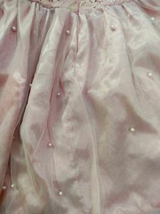 A Used Baby Girl Peach Color Frock