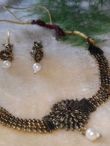 Neckpiece And Earpiece