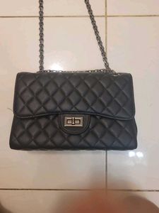black bag with grey chain
