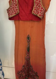 Orange Embellished Salwar Kameez with Vest