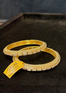 Oscar golden bangles