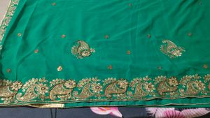 Elegant rama colour Embroidered Saree