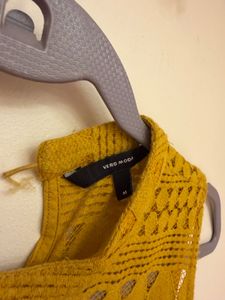 Sleeveless high neck top with slip