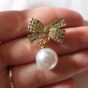 Bow Pearl Dangle Earrings