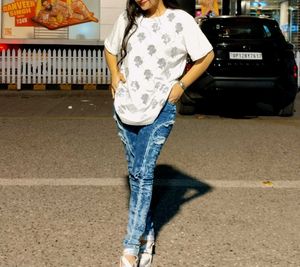 Ripped Blue Jeans With White Baggy Tshirt