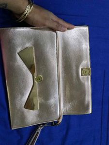Metallic Bow Clutch