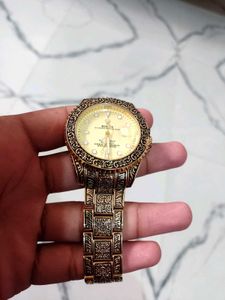 Ornate Gold Rolex Oyster Perpetual Date