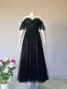 Black sequined Lux gown