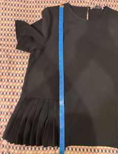 Elegant Black Pleated Hem Top