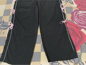 Trendy Black Track Pants with Pink Ribbon