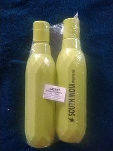 2 Green Plastic Bottles